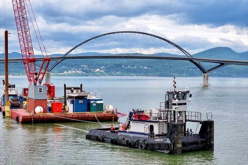 Lucy LC tug with crane barge at the waterway crossing