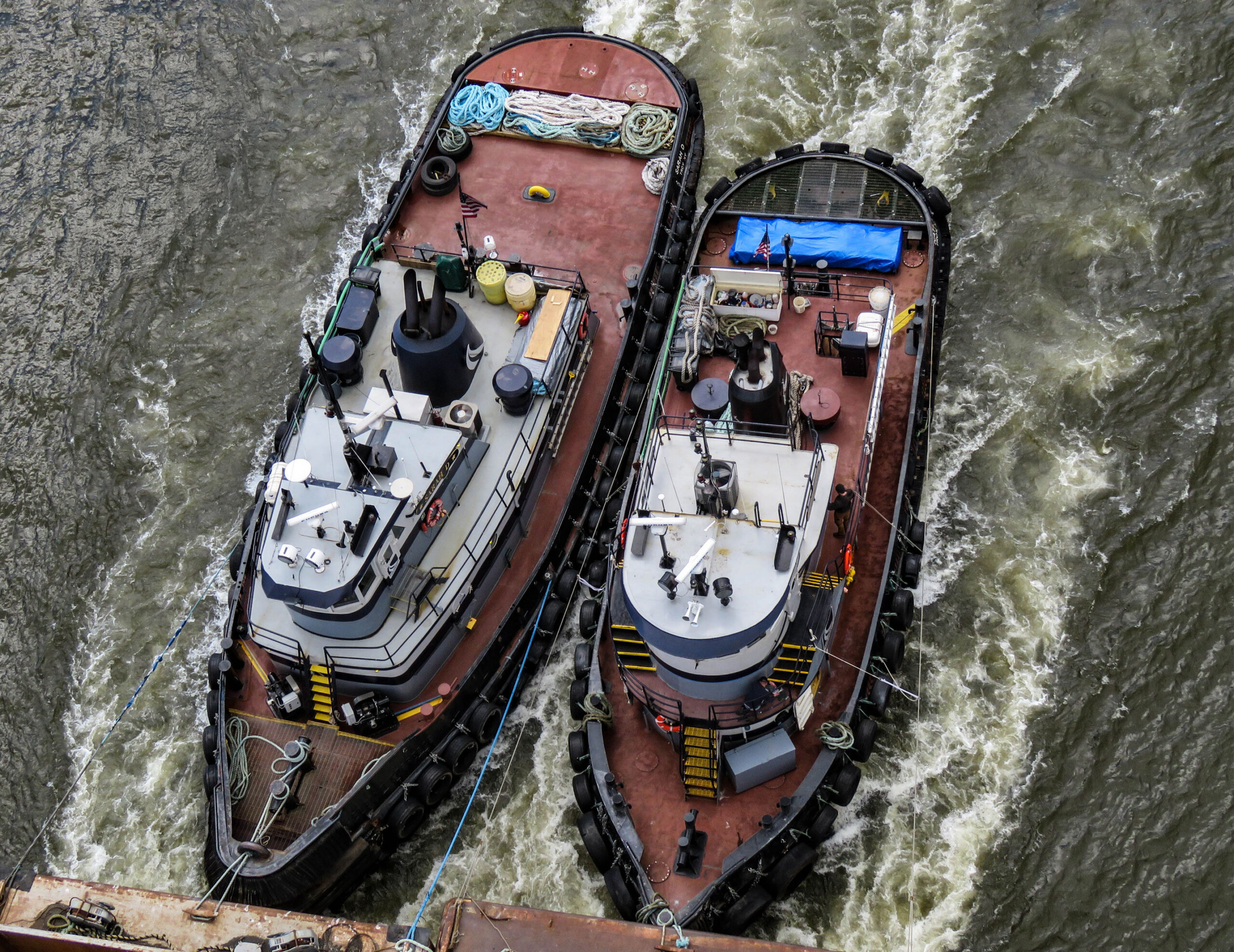 Two tugs with tow on New York State waterways
